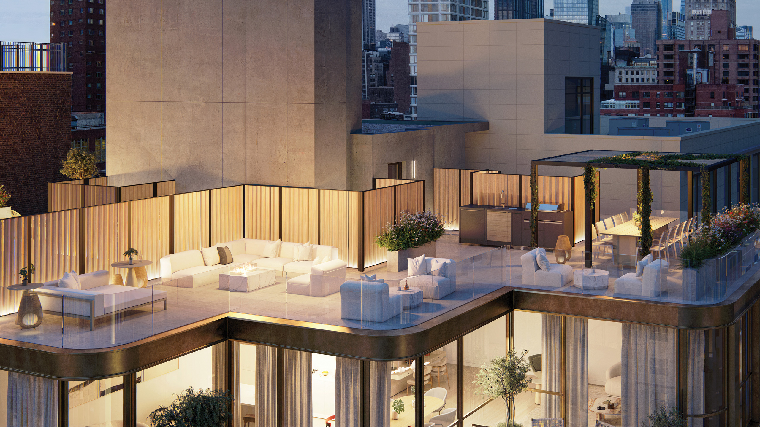 Luxurious landscaped rooftop lounge with couches and dining at Hendrix House NYC condominiums in Kips Bay.